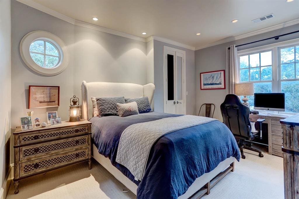 One of four secondary bedrooms in the home at 1821 Sharp Place in River Oaks.  (Photo by TK Images)