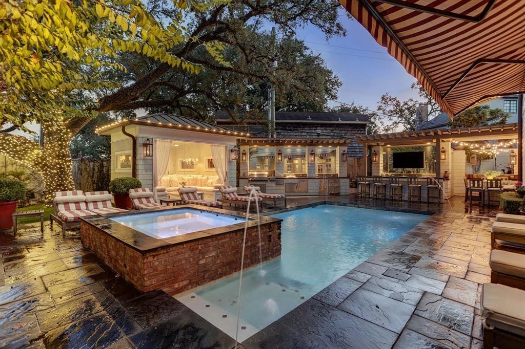 The resort-style pool terrace at 1821 Sharp Place. (Photo by TK Images)