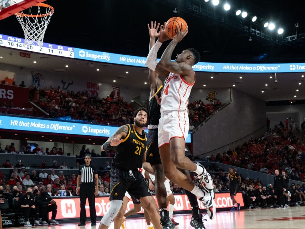 Taze Moore does something of everything for this UH team. (Photo by F. Carter Smith)