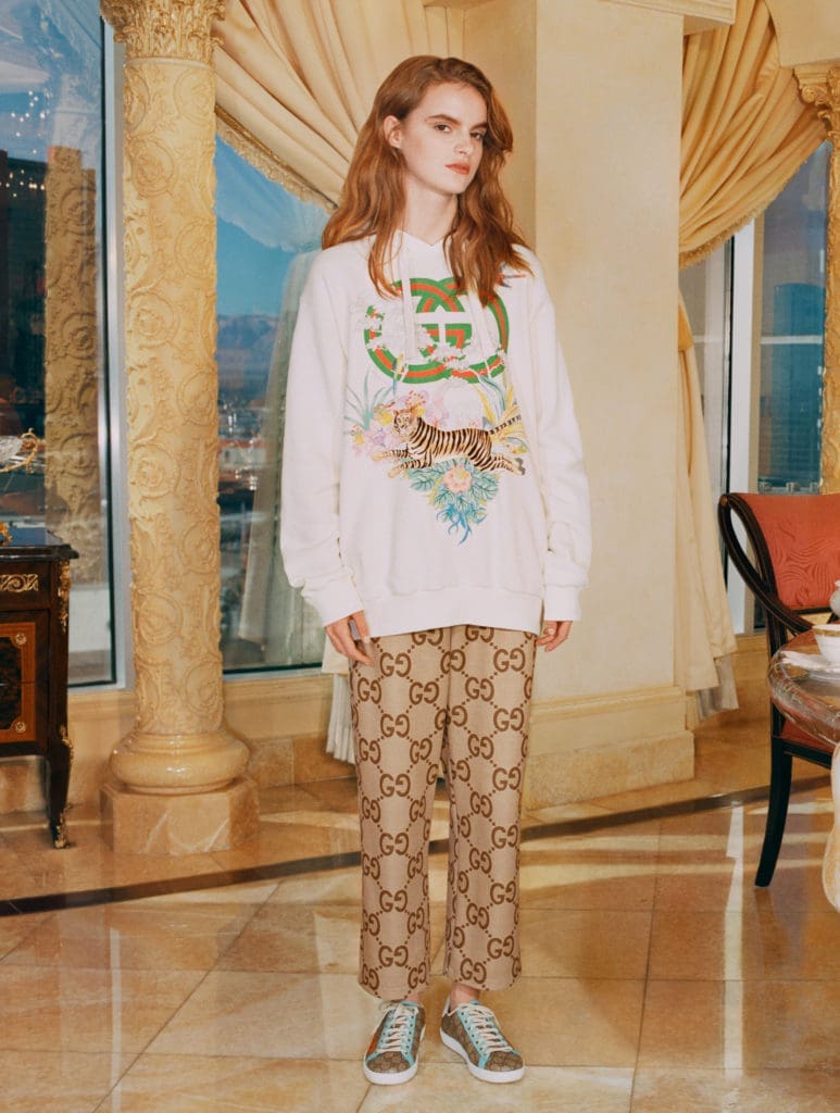 Gucci salutes the Year of the Tiger with a complete ready-to-wear and accessories collection embellished with the tiger image or 'Gucci Tiger' labeling.