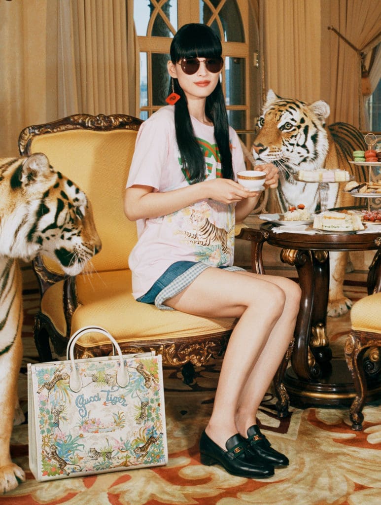 Gucci salutes the Year of the Tiger with a complete ready-to-wear and accessories collection embellished with the tiger image or 'Gucci Tiger' labeling.