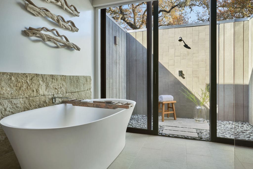 Soaking tubs and outdoor showers take each Montage Healdsburg room to the next level.  (Photo by Christian Horan)