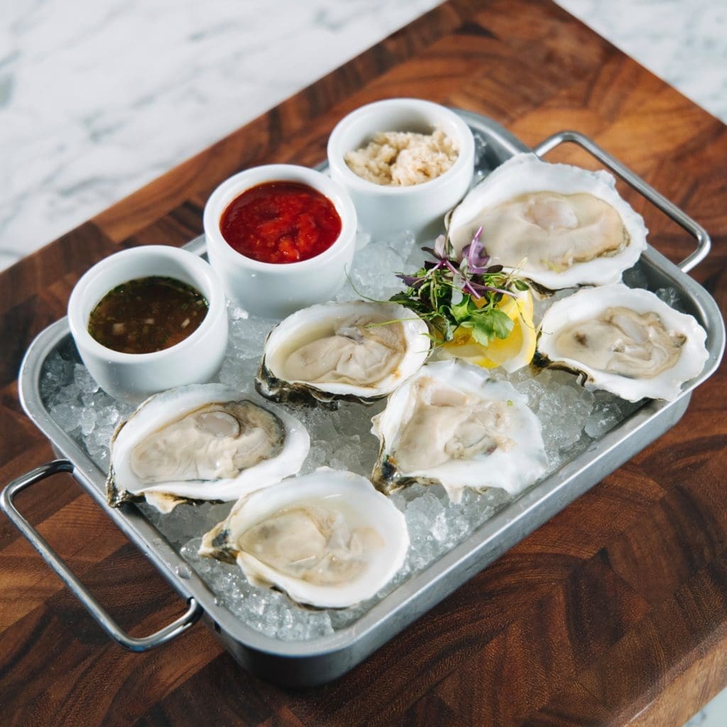 Wicked Butcher's raw bar serves these beauties with mignonette sauces.