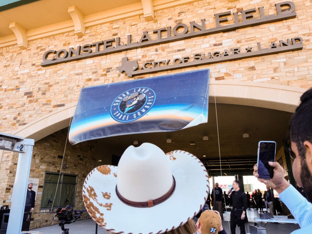 The official launch party of the Sugar Land Space Cowboys rebrand included a banner unveiling. (Photo by F. Carter Smith)