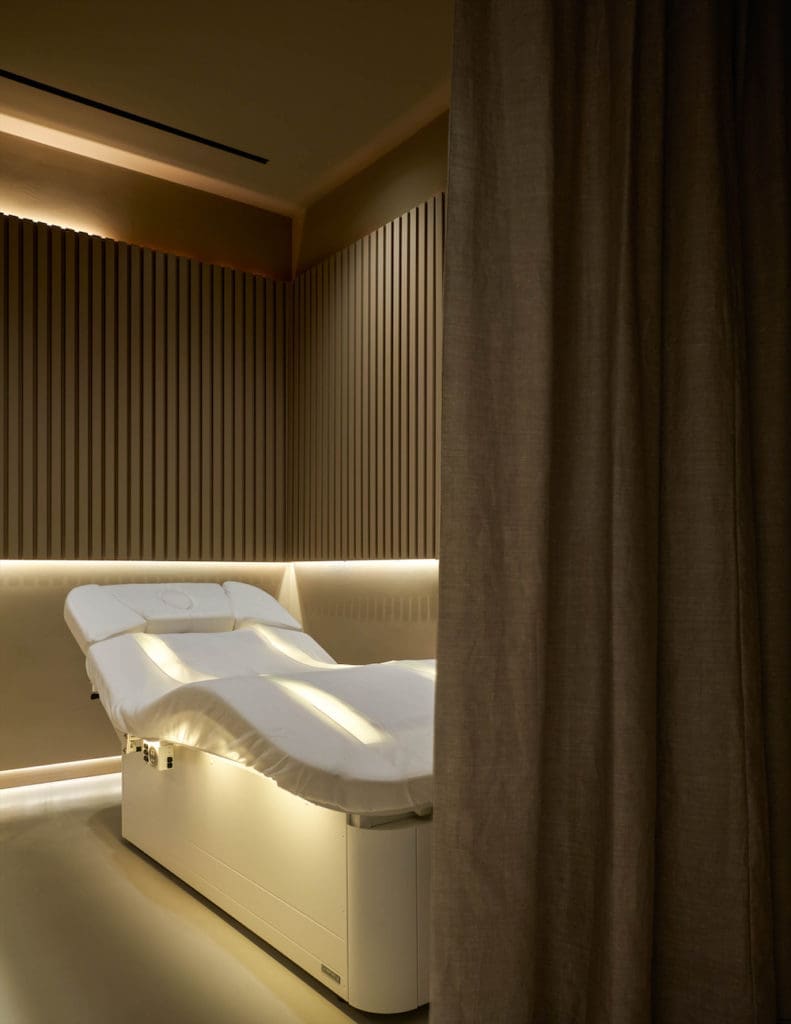 A view into one of the Dallas spa's high-tech treatment rooms, featuring Sturm's anti-inflammatory spa wave bed.  (Photo by Nathan Schroder)