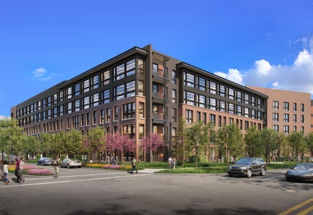 The exterior of the Laura at East River uses brick and industrial building materials to pay homage to the site, which formerly housed the headquarters for Brown & Root.
