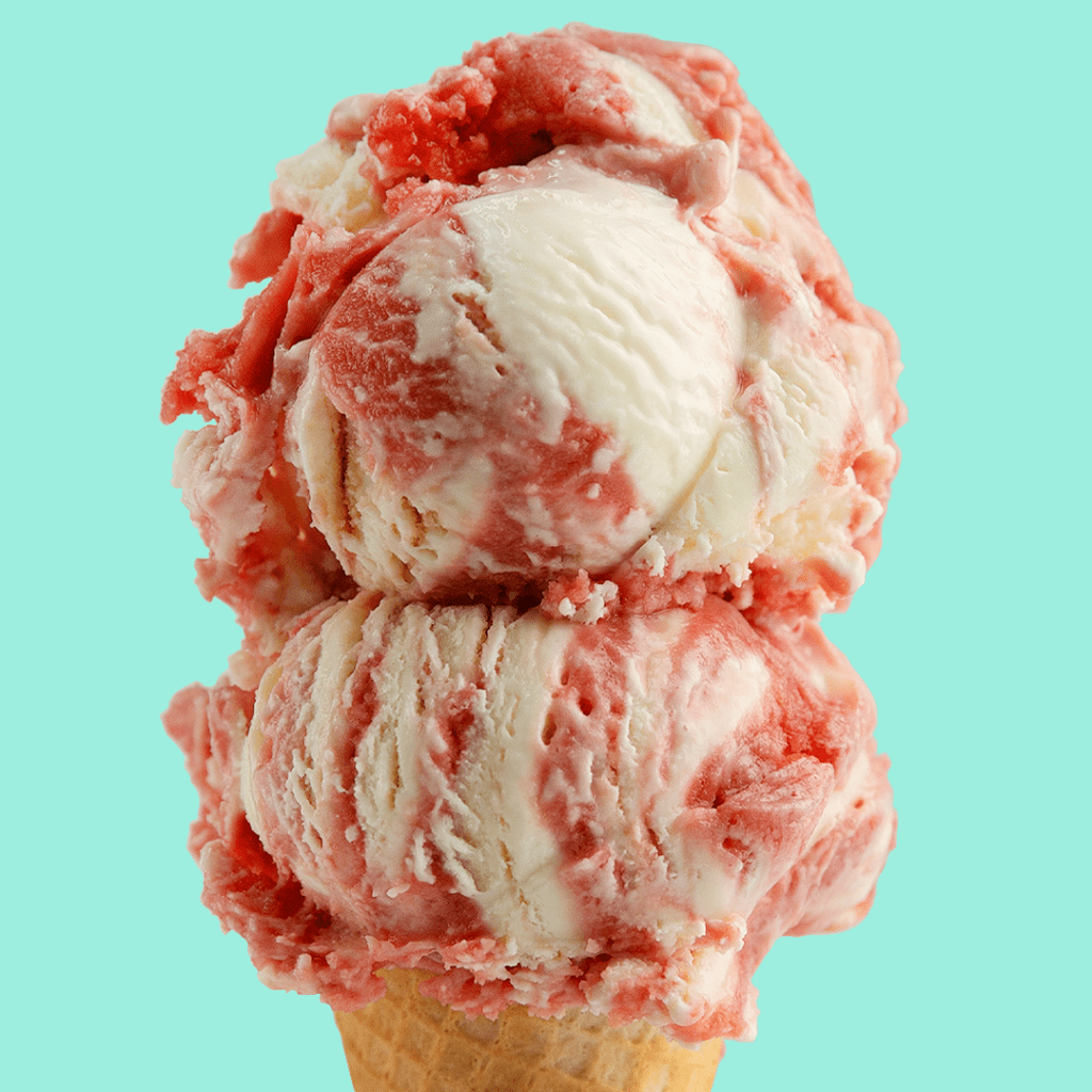 Scoops of blood orange creamsicle ice cream (a limited-edition flavor) stacked on a cone. Photo courtesy of Van Leeuwen.