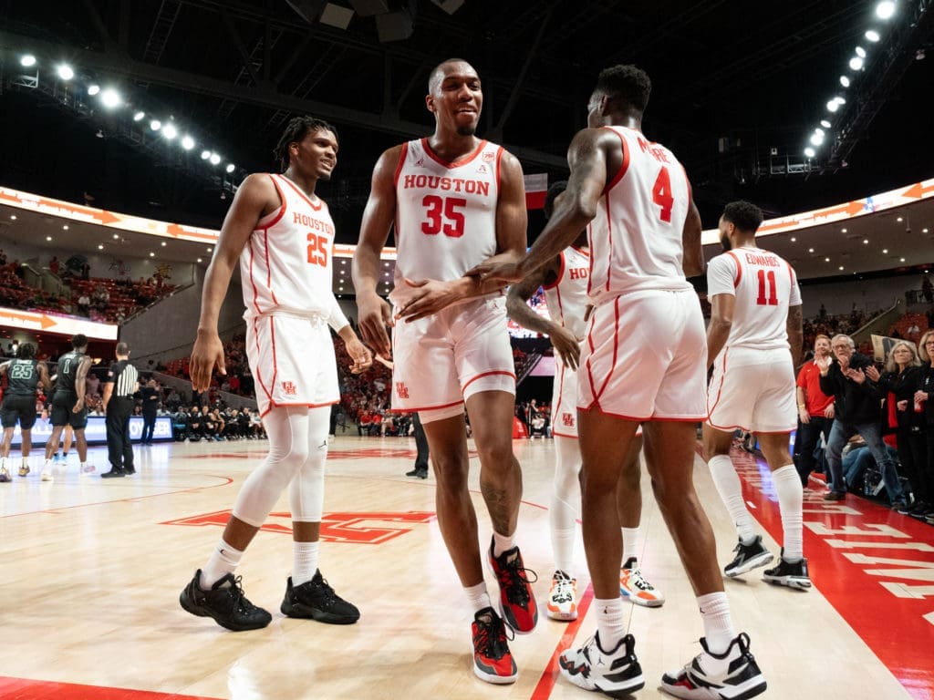 Fabian White Jr., Taze Moore and the rest of the Cougars are having fun. (Photo by F. Carter Smith)