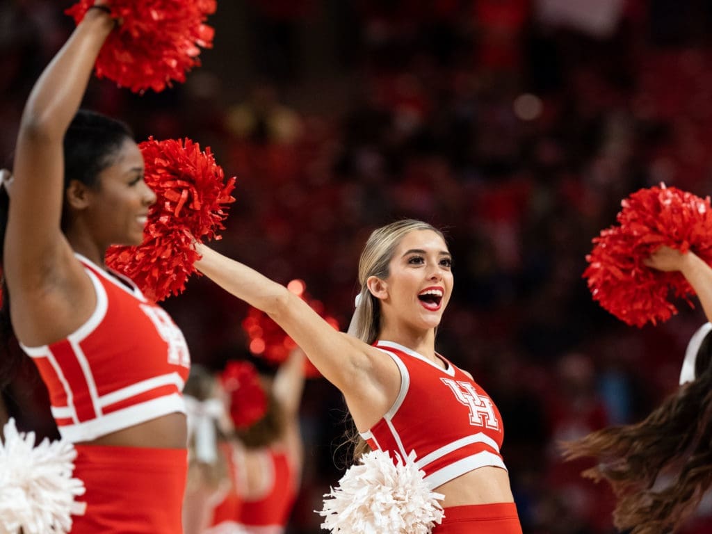 The University of Houston cheerleaders bring plenty of enthusiasm to the Fertitta Center.