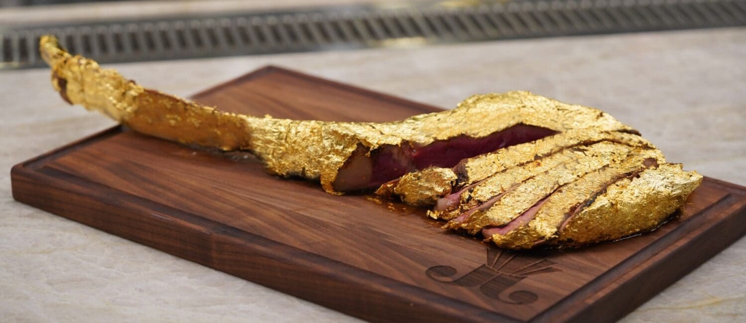 The 34-ounce USDA Prime gold tomahawk ribeye wrapped in 24k gold leaf is highlight of the menu at Juliet. (Photo by In-House Social)