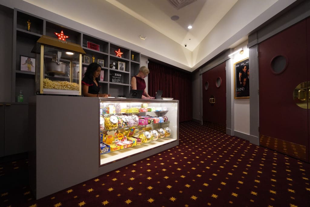 The lobby of Juliet is a dead ringer for a theater lobby where diners can purchase candies and popcorn. (Photo by In-House Social)
