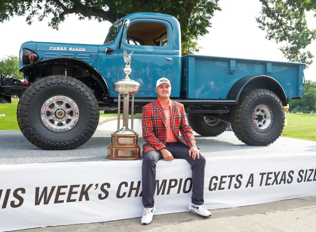 Charles Schwab Callenge's 2021 winner Jason Kokrak collects his Texas-sized trophy. 