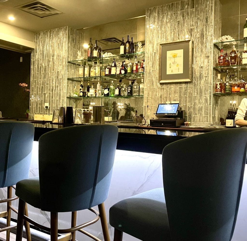 The classy front room bar is joined by a back room bar and new patio. Photo by Courtney Dabney.