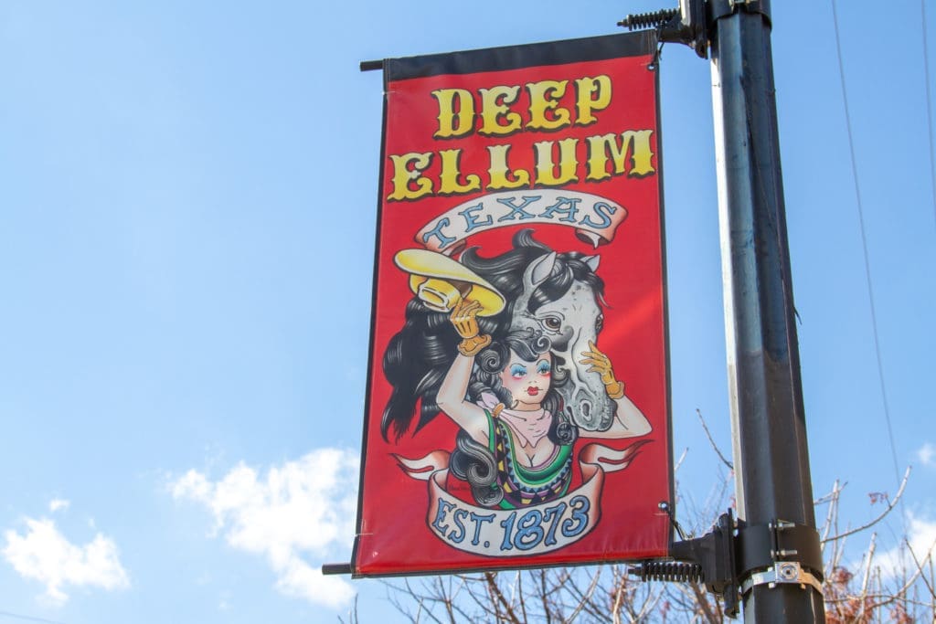 The late Dean Williams of Elm Street Tattoo has one of 10 banners by local  tattoo artists in Deep Ellum.
