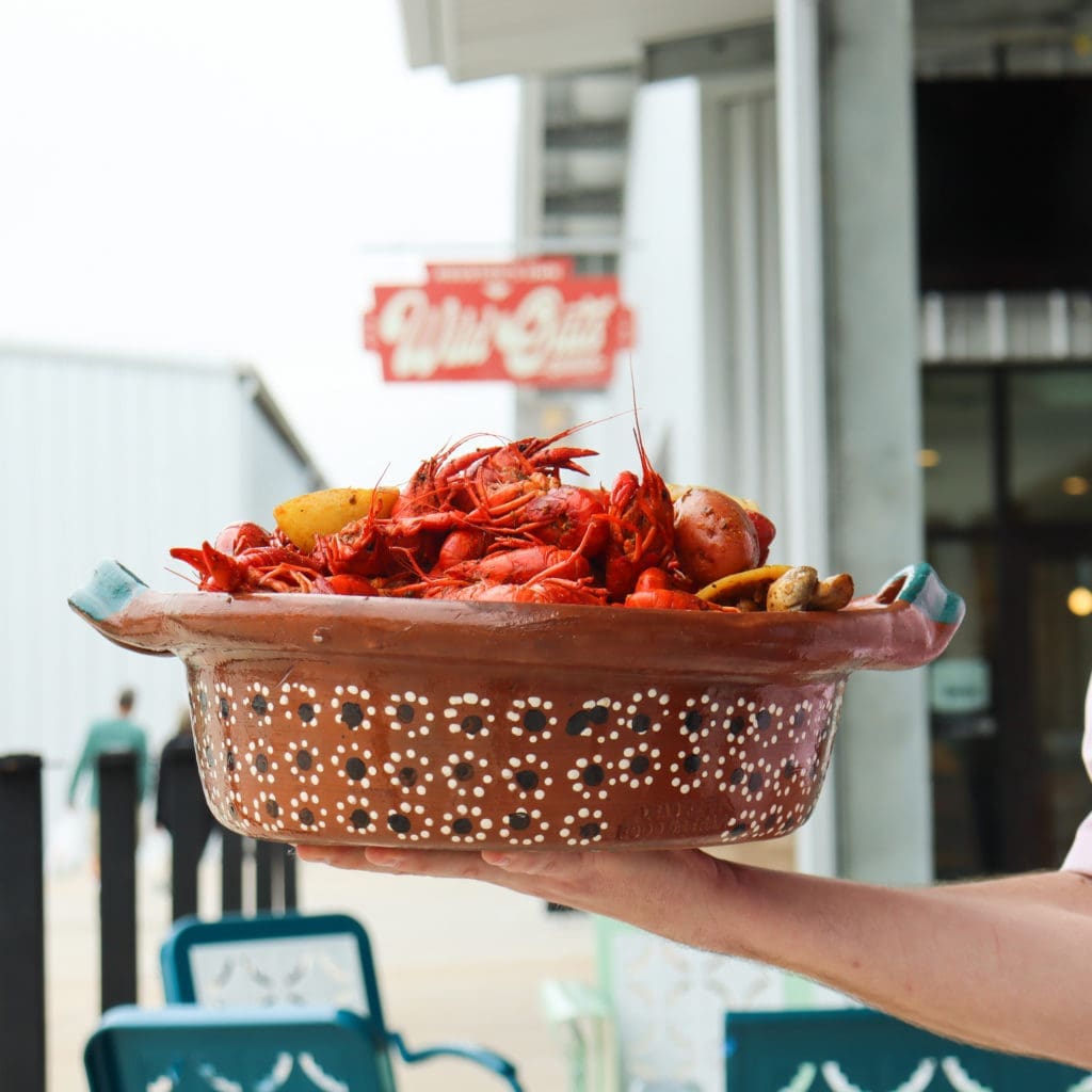 It's crawfish season and the spanking new Wild Oats in the Houston Farmer's Market is boiling them up for the Sunday buffet. 
