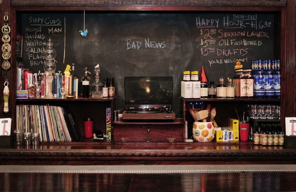 Capt. Foxheart's bulletin featuring happy hour announcements and old-school items. (Courtesy of Captain Foxheart's Bad News Bar & Spirit Lodge)