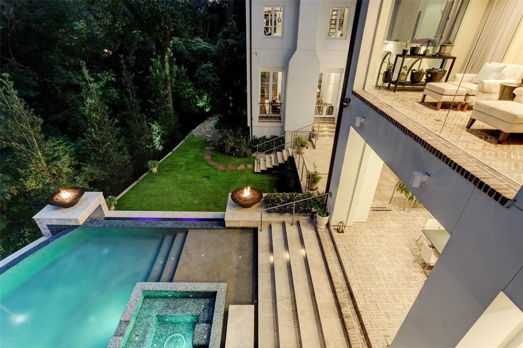 The ravine lot at 59 Tiel Way in River Oaks lends  itself to dramatic hardscaping.
