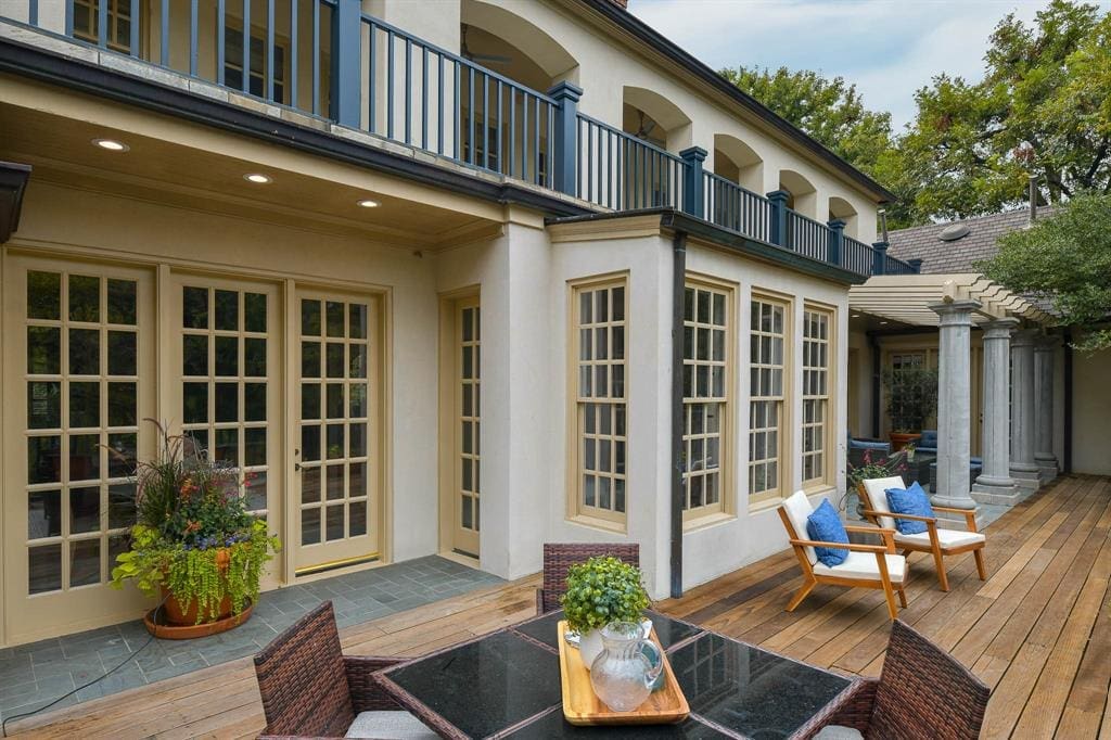 Window-lined terraces command the first and second floor. 