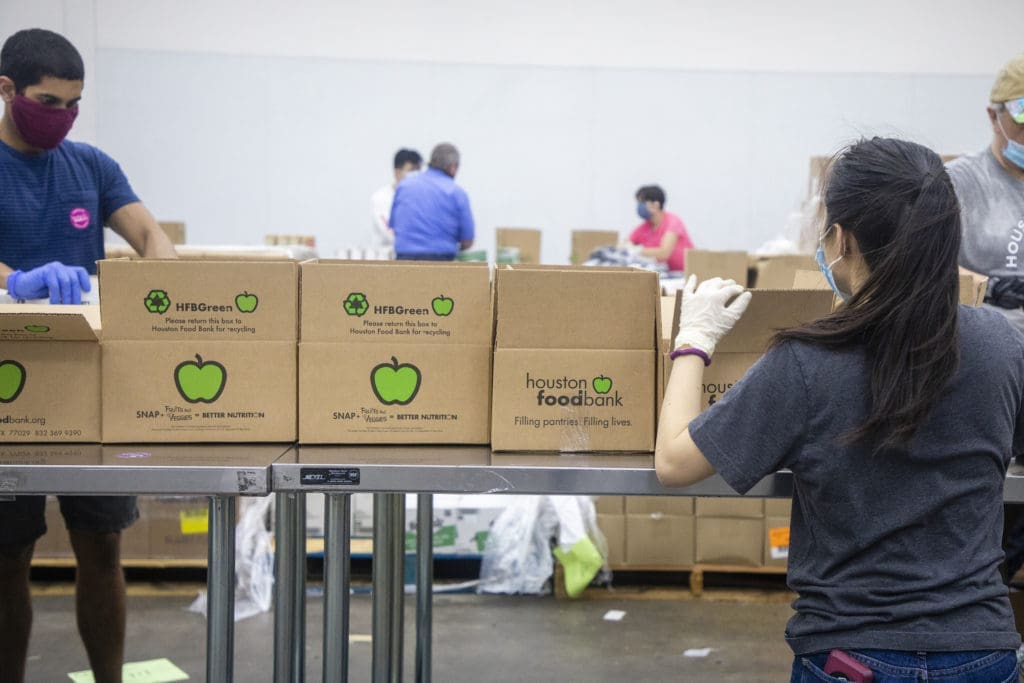 During the COVID-19 pandemic volunteers worked to load and unload boxes of supplies to those in need. (Photo: The Houston Food Bank)  (Photo by The Houston Food Bank)