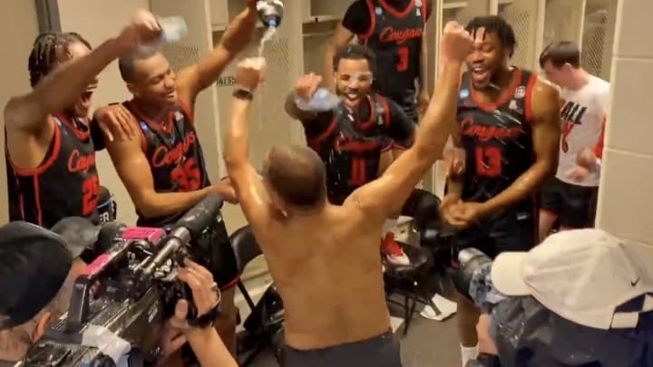 Houston coach Kelvin Sampson ripped off his shirt to celebrate a Sweet 16 punching win over Illinois. (Credit: KHOU photo)