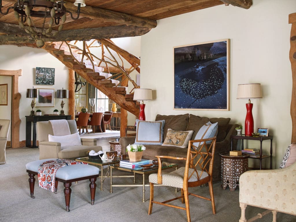 Tyler, Texas architect Mike Butler oversaw the renovations and additions, which included a rustic staircase crafted by carpenters from felled cedar trees and branches on the property. (Photo by Tria Giovan)