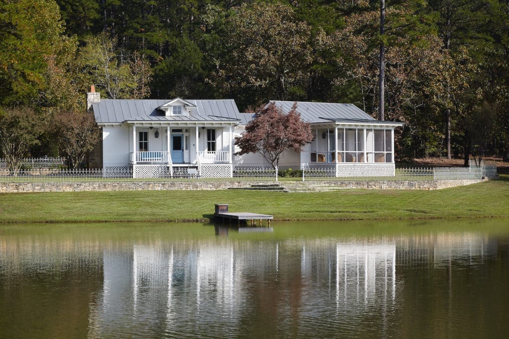 Tyler architect Mike Butler designed Rose Cottage to feel like it had been added to over the years, reminiscent of early East Texas farmhouses that were clad in wood with a pitched metal roof and screened-in sleeping porch. (Photo by Tria Giovan)