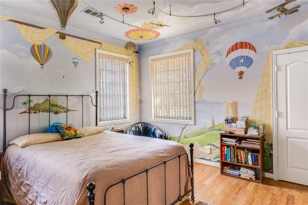 An aircraft-inspired room with propeller planes and hot air balloon. 