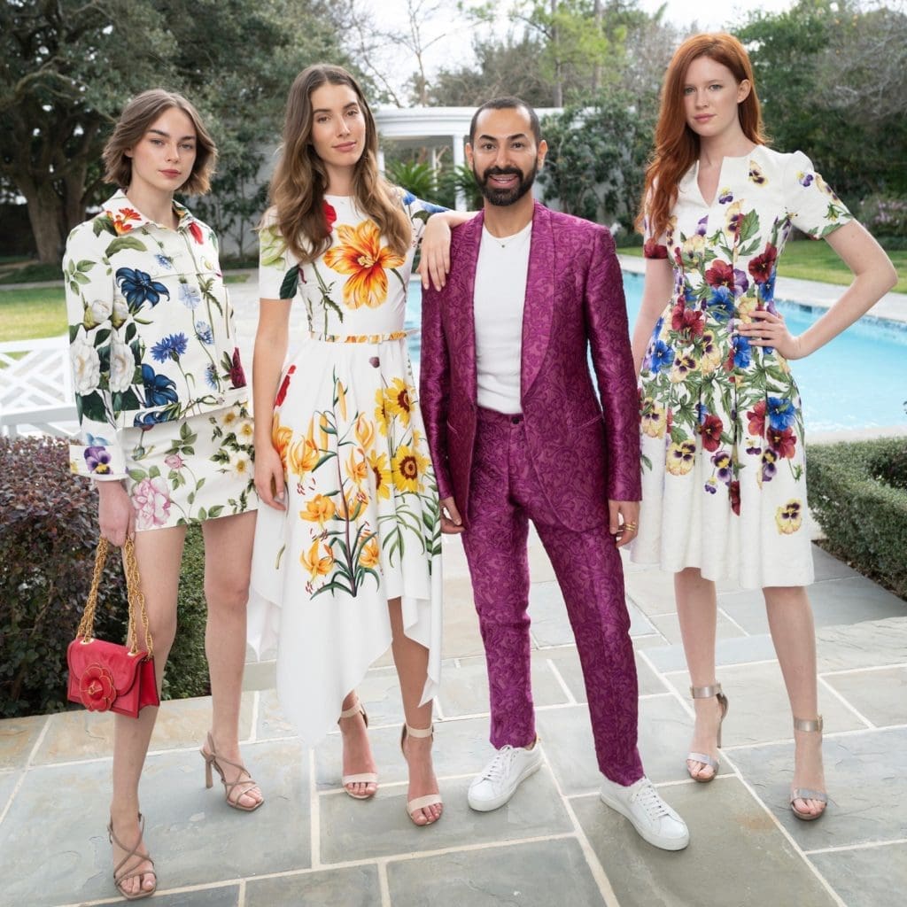 Tootsies' creative director Fady Armanious, wearing Dolce & Gabbana, is surrounded by models in Oscar de la Renta pre-fall fashions during a pop-up benefiting TEACH. (Photo by Daniel Ortiz)