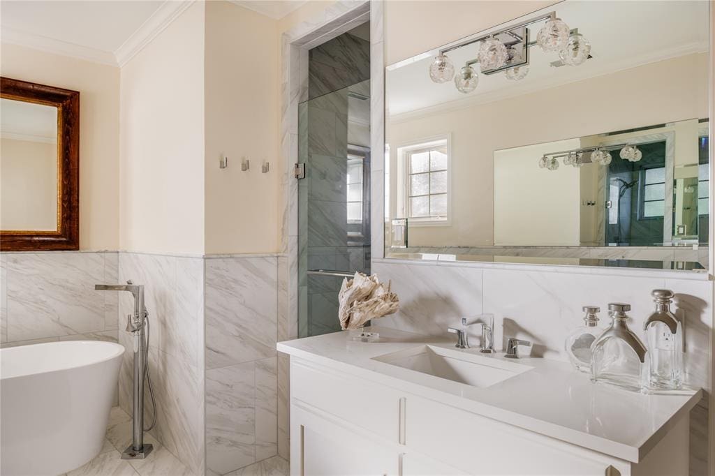 The master's en suite bathroom has been beautifully remodeled. 