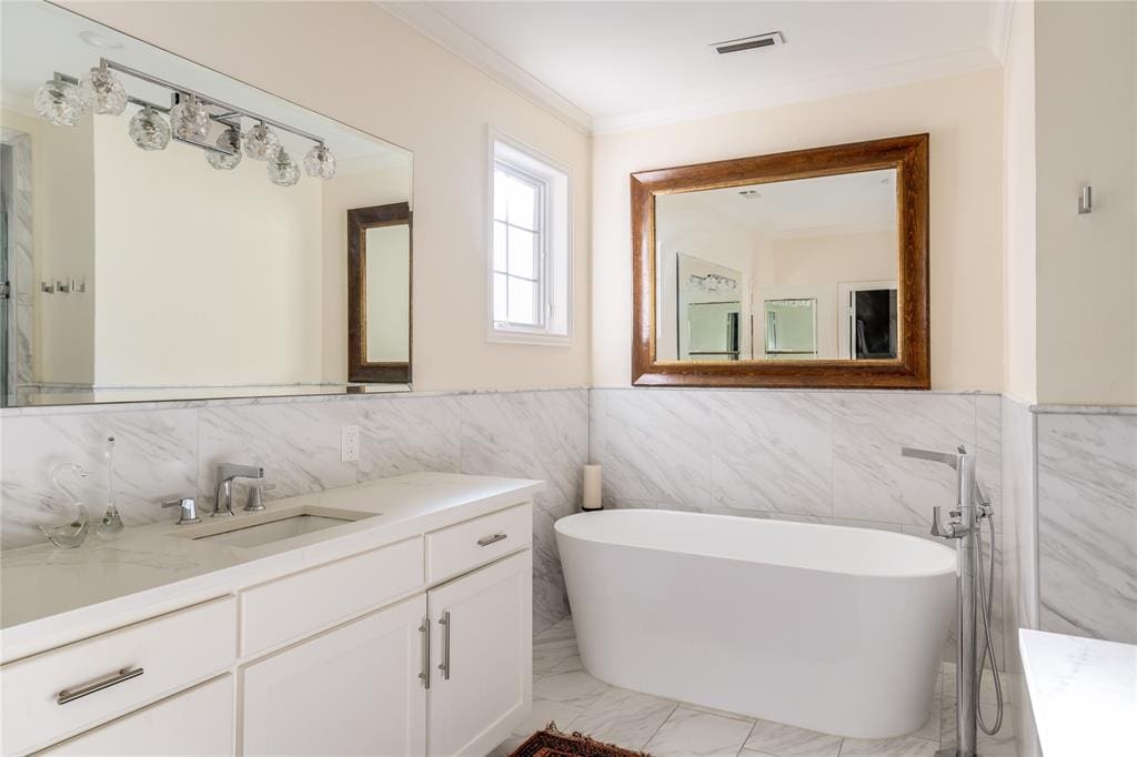 The master's en suite bathroom has been beautifully remodeled. 