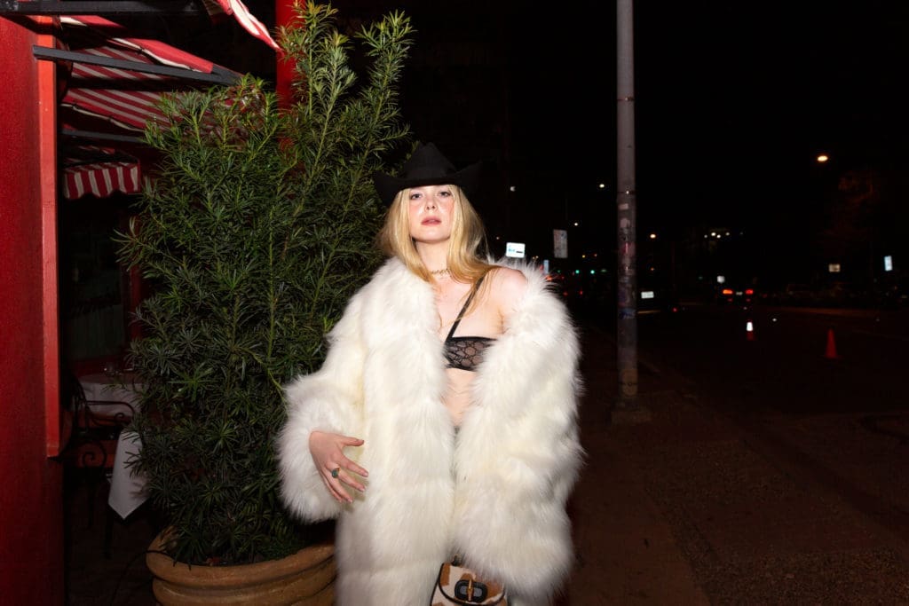 Actress Elle Fanning poses outside of Austin hotspot Sammy's Italian for the Gucci  x Bumble gathering during SXSW.(Courtesy of BFA for Gucci)