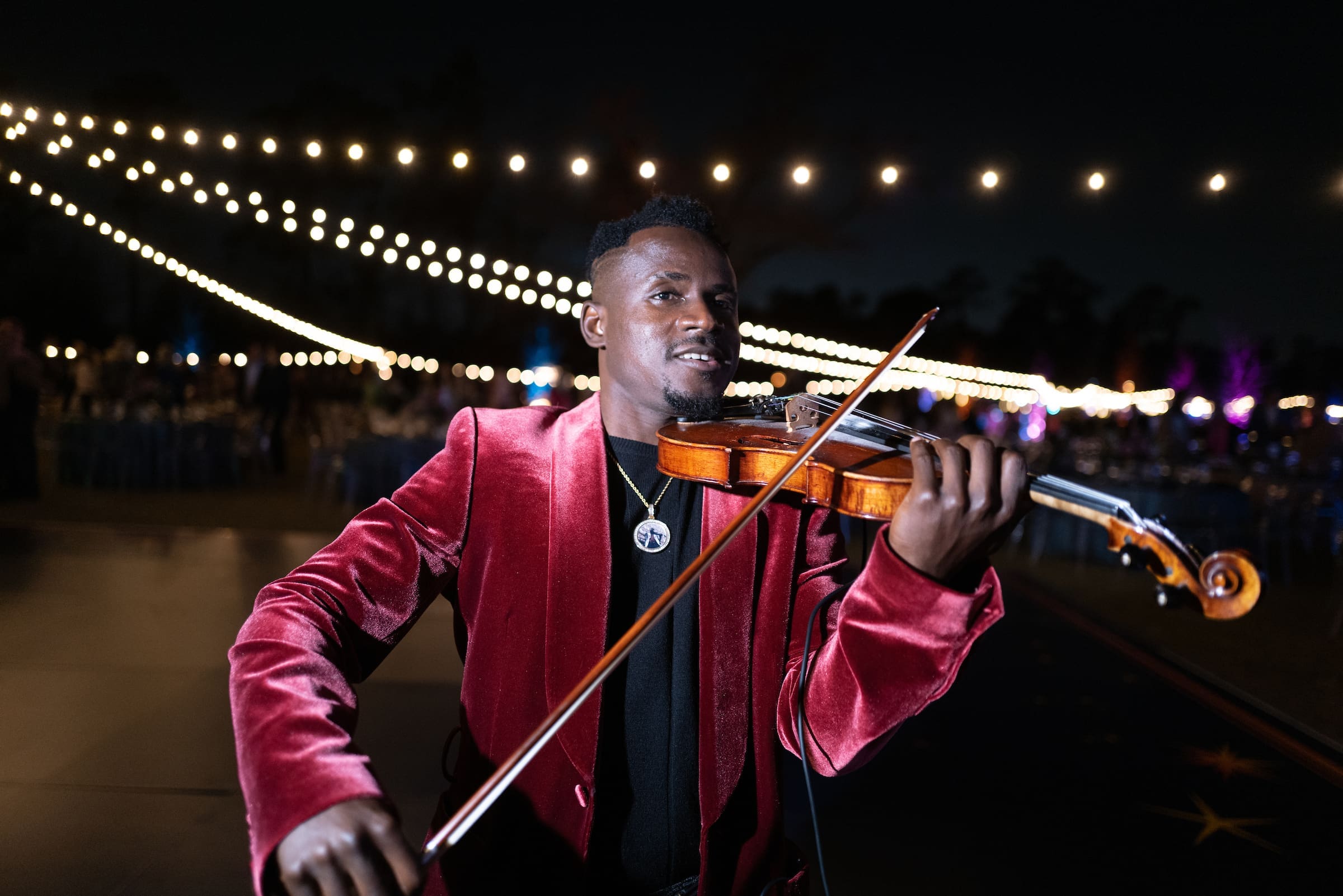Demola the Violinist at Star Light Soiree Picnic for the Park (2); Image by Daniel Ortiz Courtesy of Memorial Park Conservancy.jpg