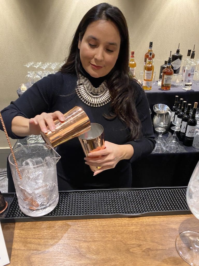 Heralded bar tender Alba Huerta mixing her special concoctions at the Truffle Masters competition. (Photo by Shelby Hodge)