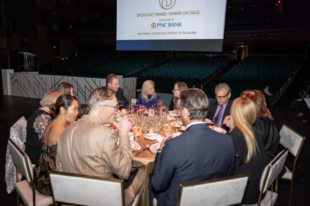 Ken Novice hosts table guests (Photo by Thomas Garza Photography)