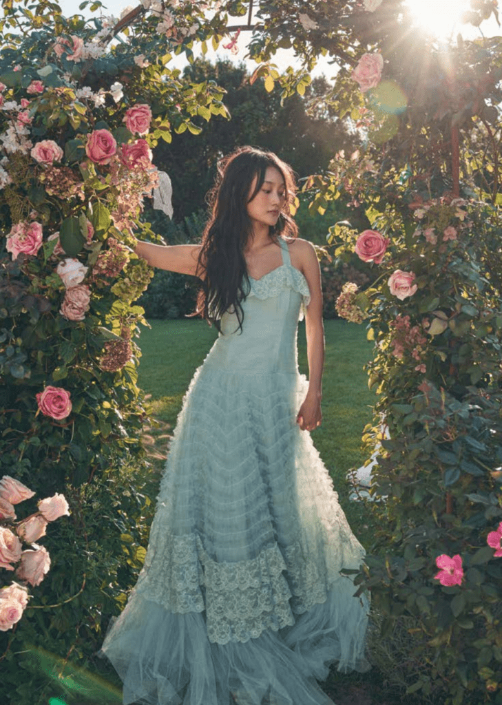 Sharelle Gown shows off LoveShackFancy's Blue Shell dress.