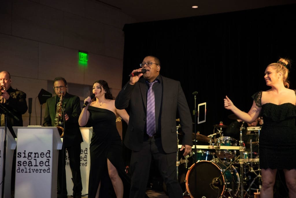 Signed Sealed Delivered performed for the party-ready guests. (Photo by Tamytha Cameron   )