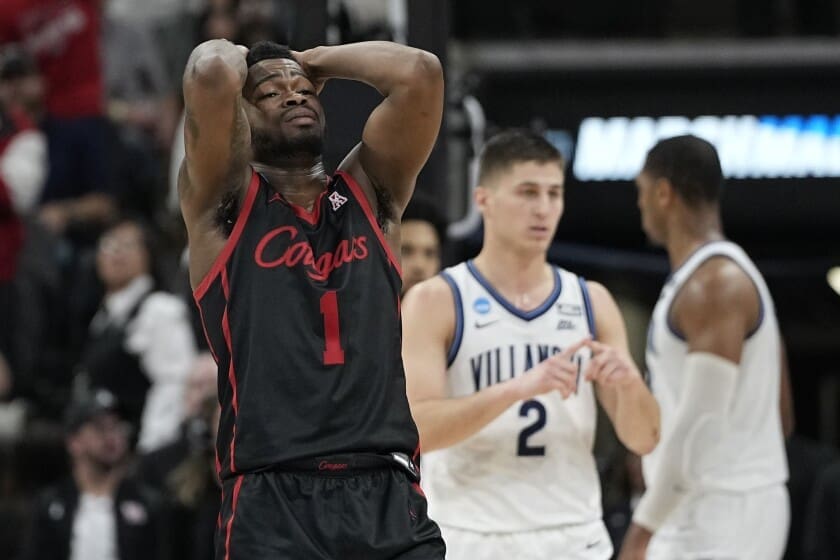 UH point guard Jamal Shead cannot contain his emotions after the Cougars' loss to Villanova in the Elite Eight.