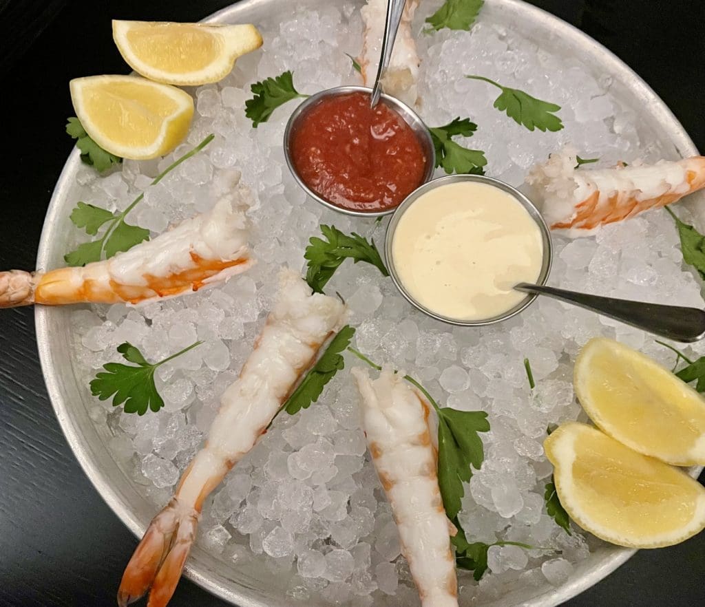 Giant Rock Shrimp served on ice with dijonaise and red sauce at il Modo. Photo by Courtney Dabney.