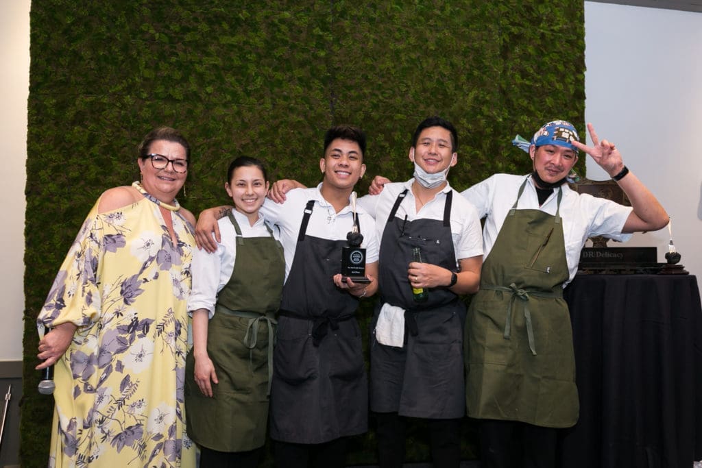 Truffle Masters founder Diane Roederer with chef Sherman Yeung and his team from soon-to-open Money Cat which took second place at the Truffle Masters competition. (Photo by Emily Jaschke, zenfolio.com)