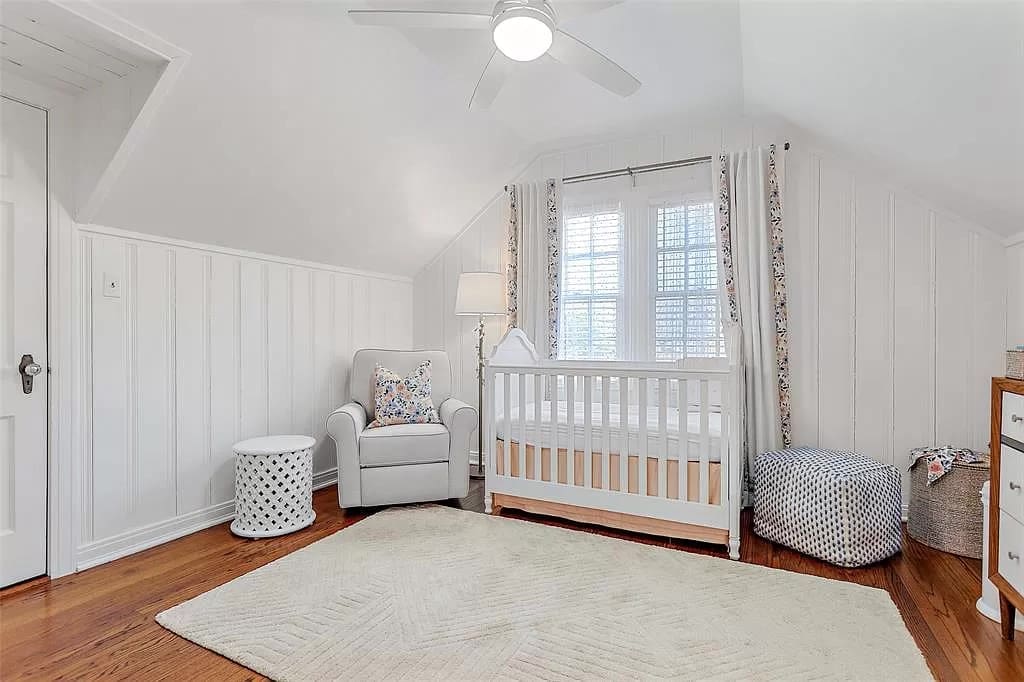 The third bedroom upstairs is fashioned as a nursery. 