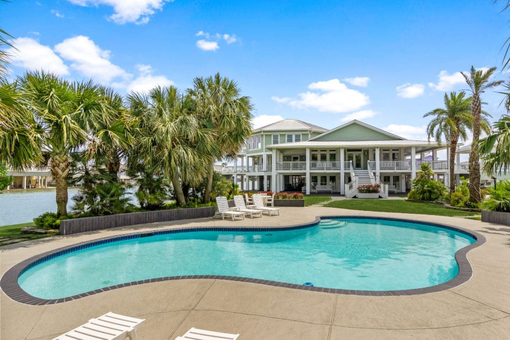 The swimming pool at 16502 Bayfront Drive in Jamaica Beach, listed with Douglas Elliman Realty (Photo by Sonya Bertolino for Douglas Elliman Realty)