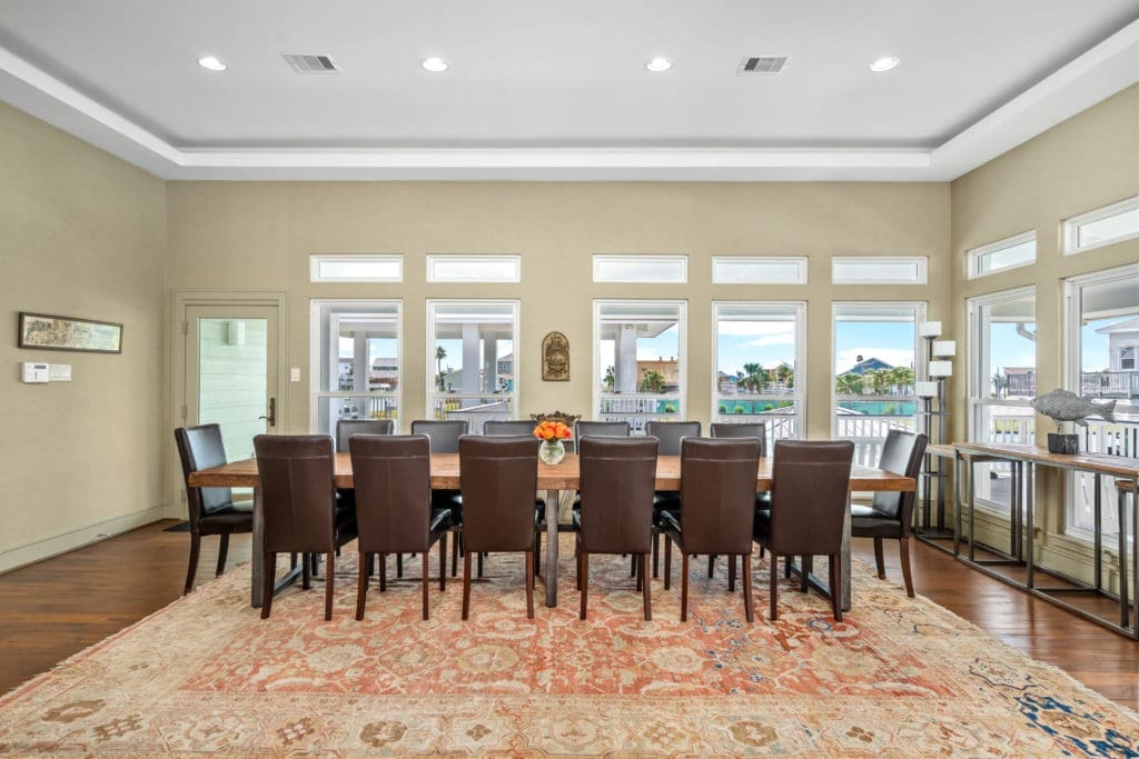 The spacious dining room of 16502 Bayfront Drive in Jamaica Beach (Photo by Sonya Bertolino for Douglas Elliman Realty))