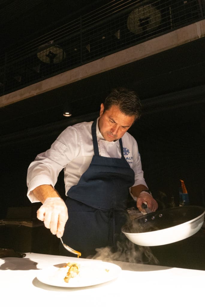 Amalfi's Giancarlo Ferrara cooking at the Bon Vivant Dinner. (Photo by Daniel Ortiz)