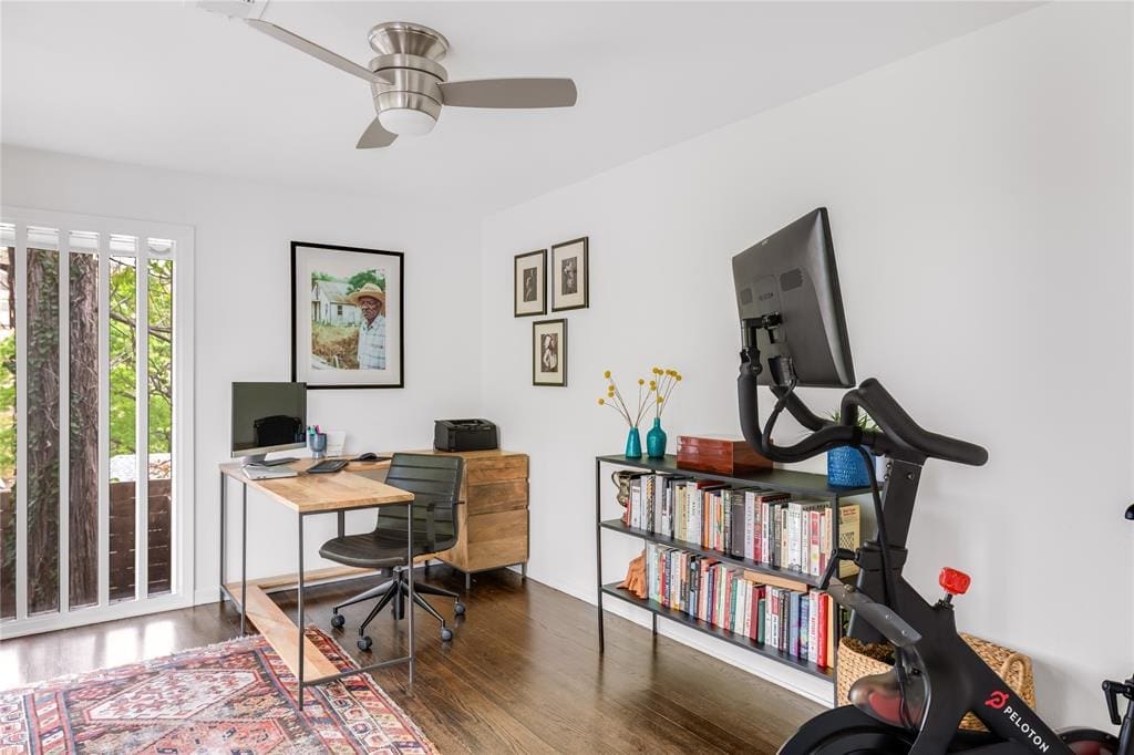 A spare room fashioned as a sunny office. 