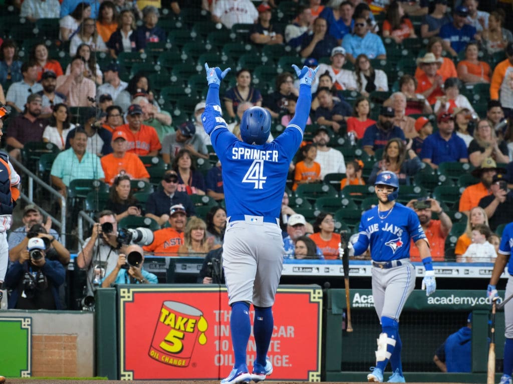 George Springer pointed to the sky after another Minute Maid Park home run. Only, this time he wore Blue Jays' blue. (Photo by F. Carter Smith)