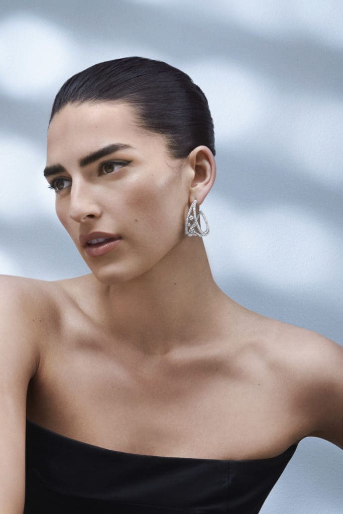 Hoop earrings from De Beers Jewellers' Atomique facet of The Alchemist of Light high jewelry collection.