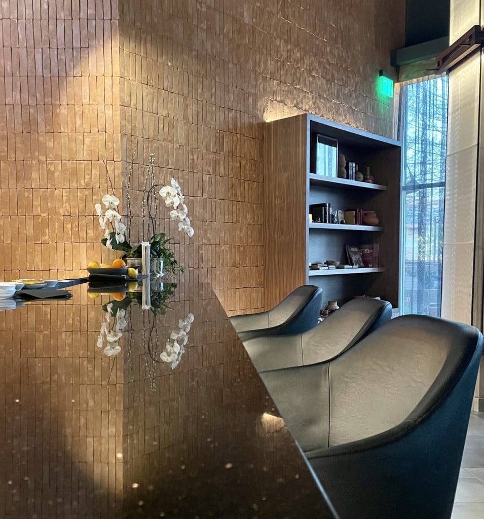 The bar at Don Artemio has a view of stacked Saltillo brickwork. (Photo by Courtney Dabney)