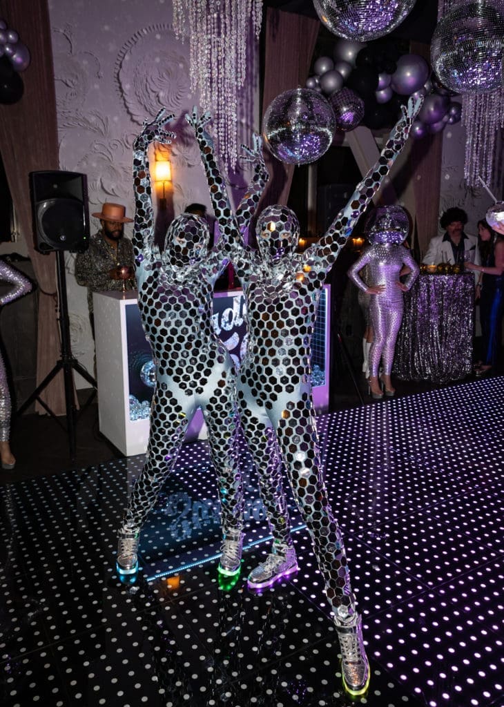 What disco party is complete without go-go dancers?