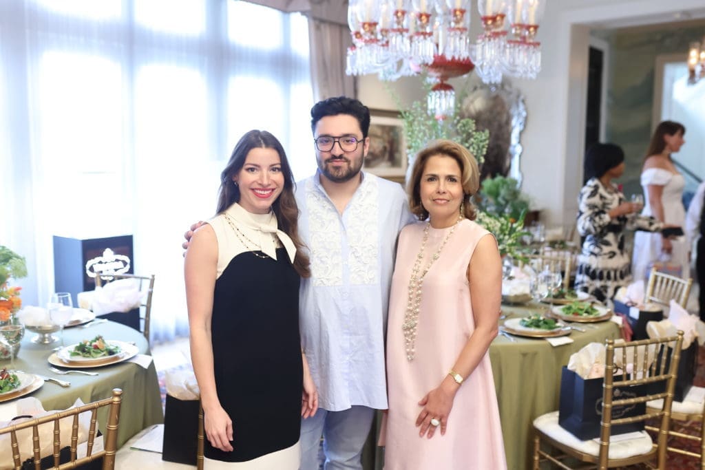 Olivia Reagan, Amir Taghi, Fariba Taghi in the Taqhi's Tanglewood home at an event 
 in HOuston April 2022. (Photo by Quy Tran)