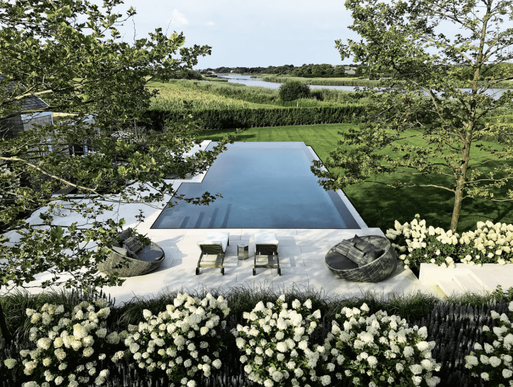 A pool and gardens in Bridge View designed by Edmund Hollander